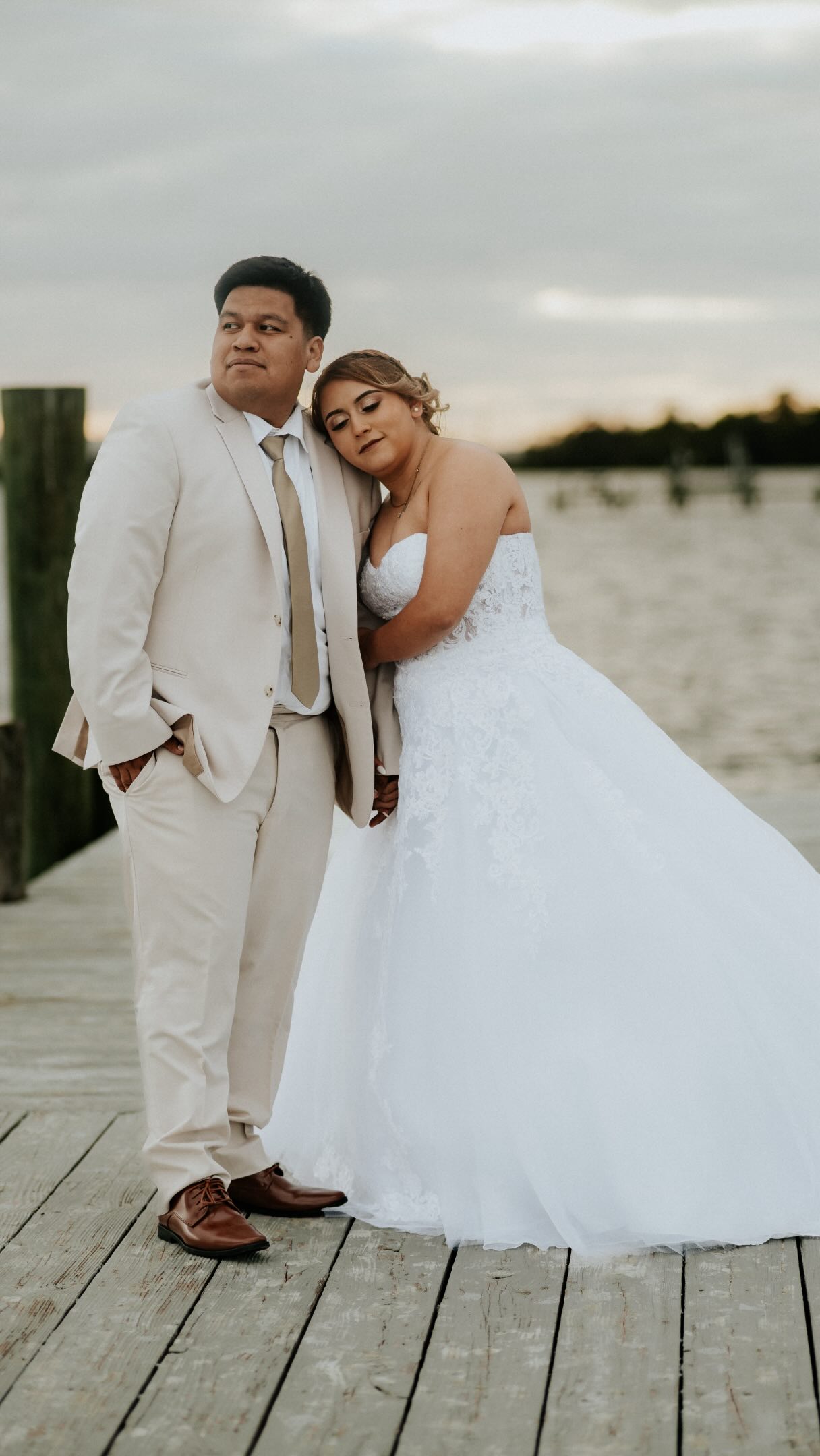 Instagram post: bride and groom by the water